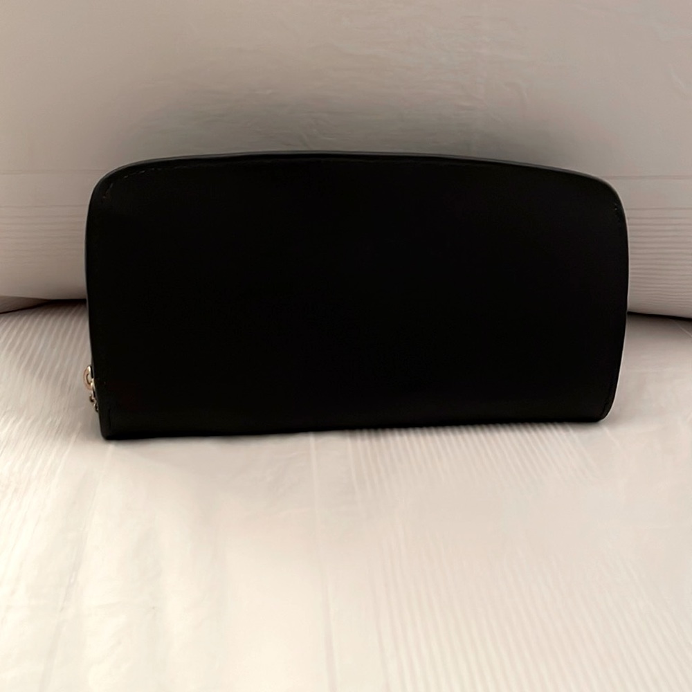 Coach large zip around wallet. A gift that was never used.